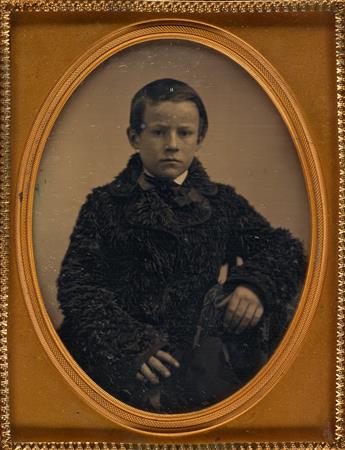 (CHILDREN) Must-be-seen group of 12 charming quarter-plate daguerreotypes and one ambrotype of privileged children, including